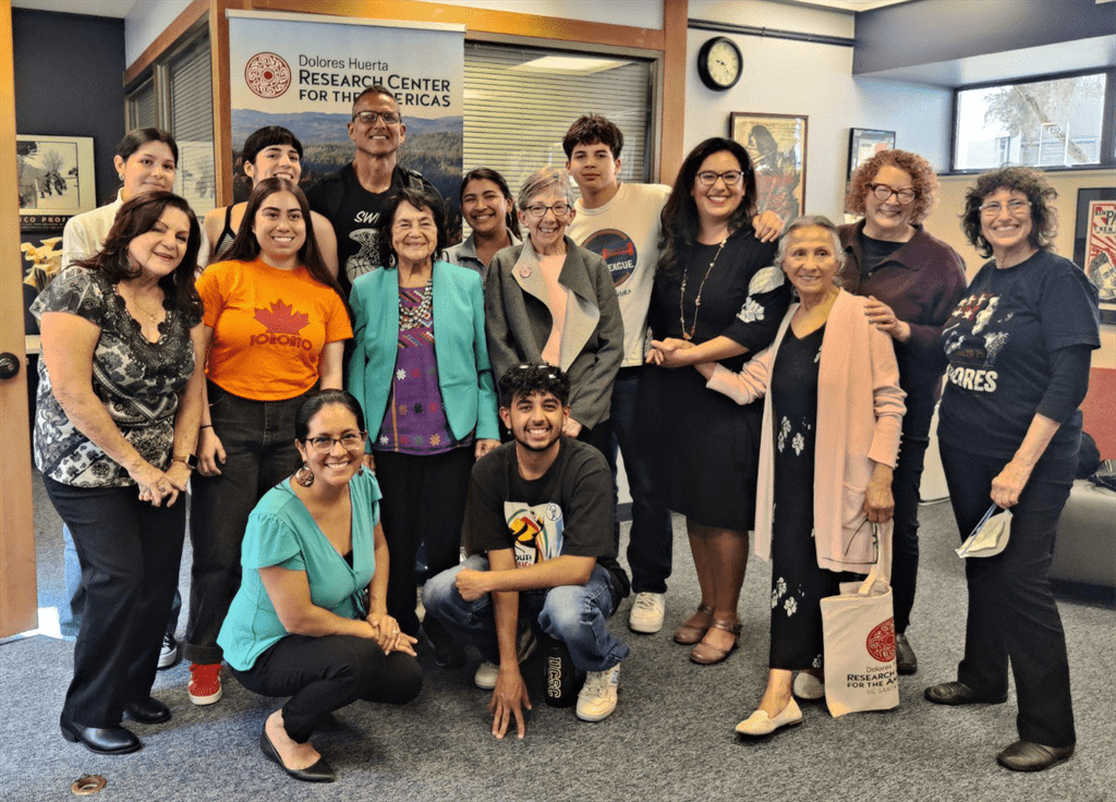 Students and campus leaders meet Dolores Huerta and her family at the research center.