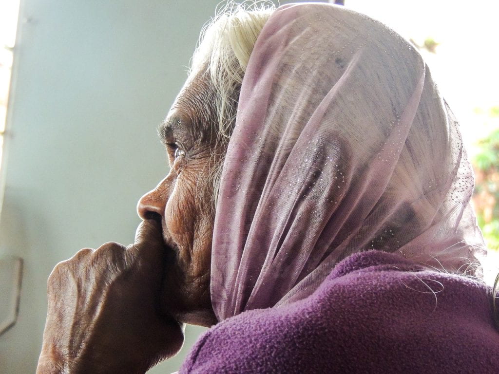 older woman in veil
